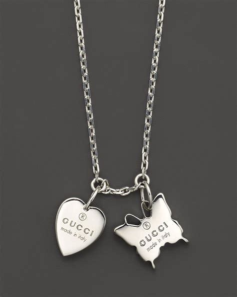 heart necklace with gucci trademark|Gucci heart butterfly necklace.